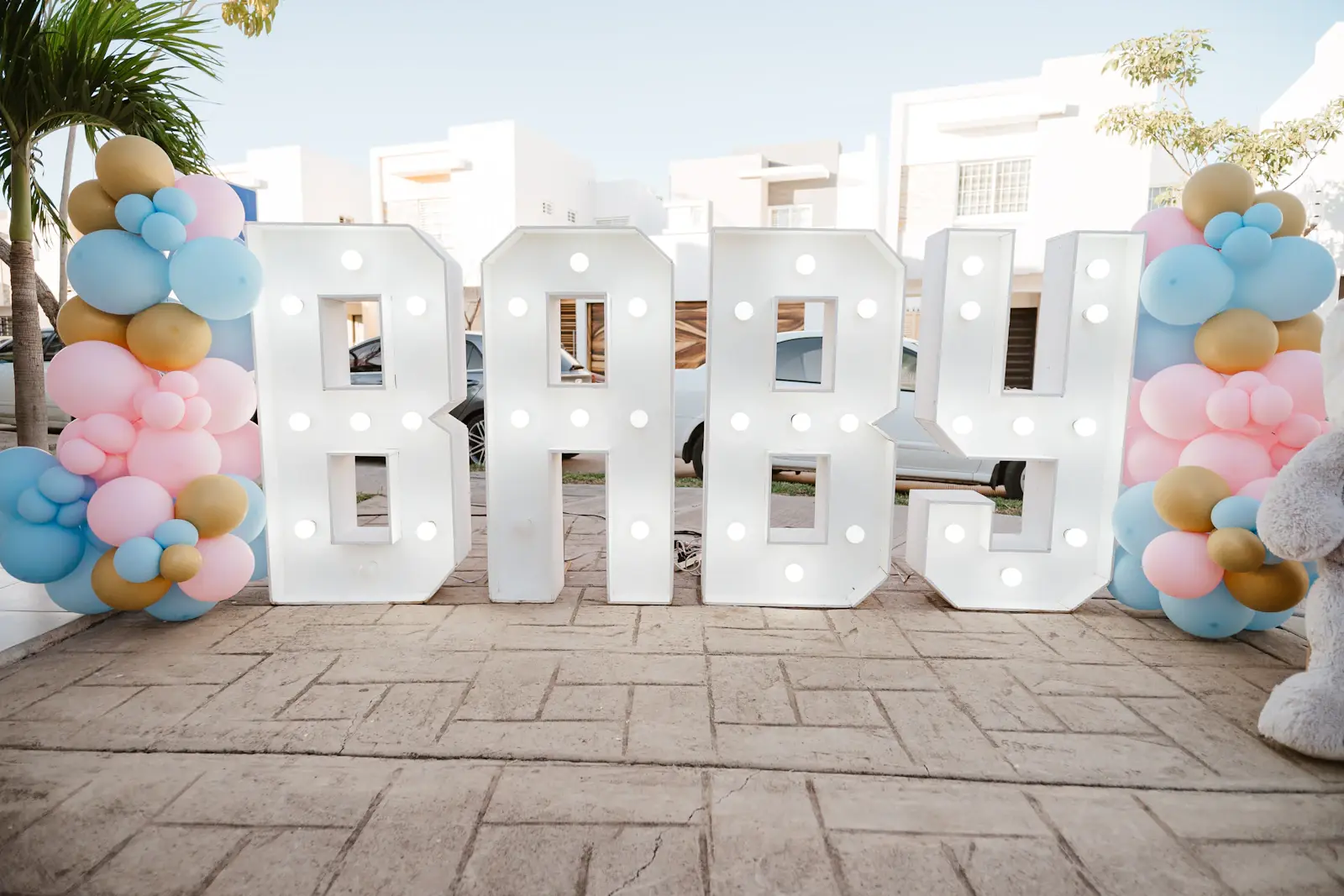 Baby shower BABY marquee letters with pastel balloons